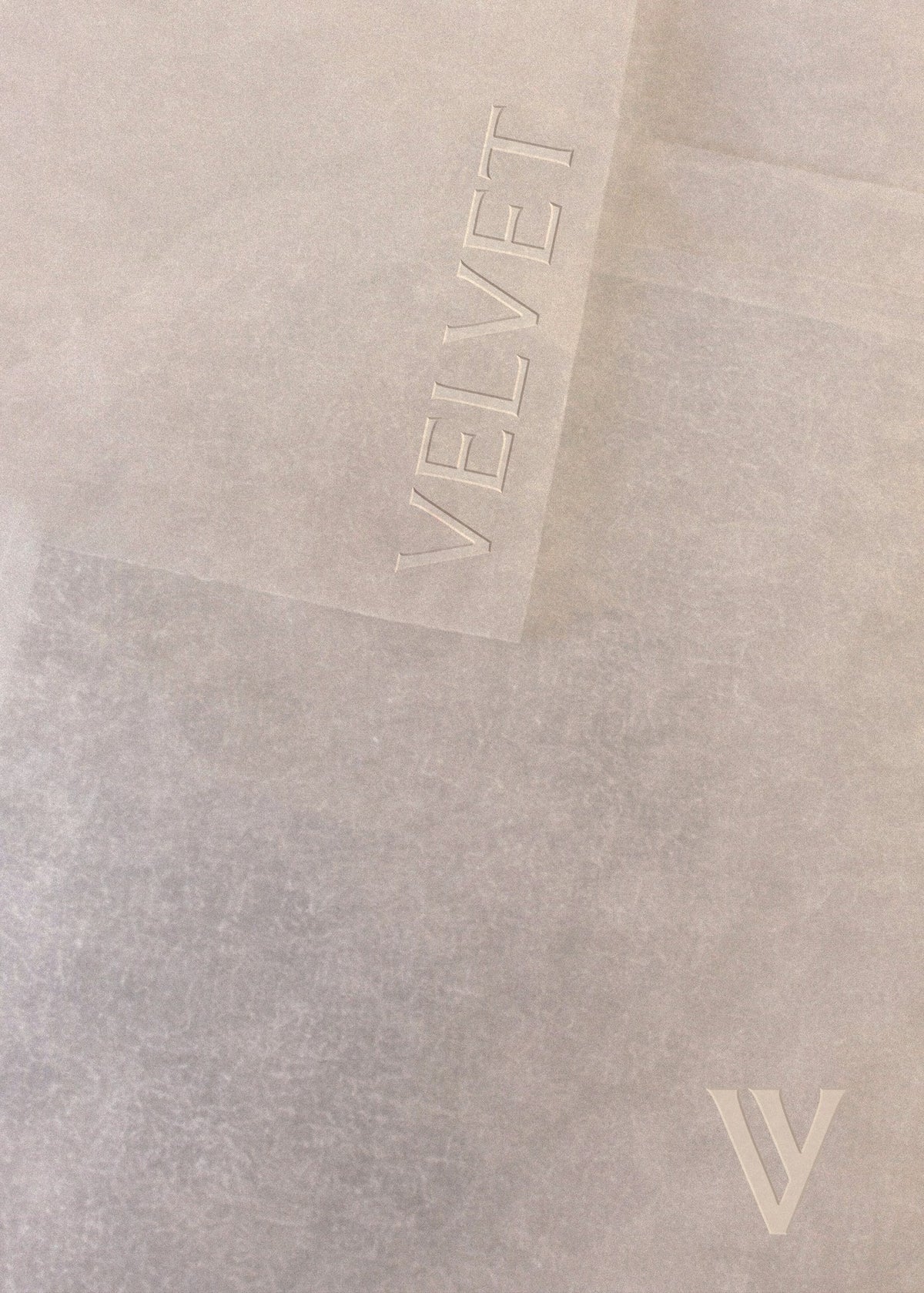 VELVET wordmark printed on tissue paper