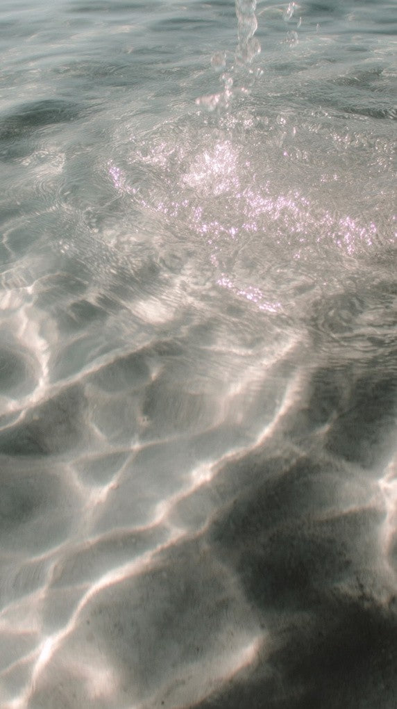 Light dancing on clear water